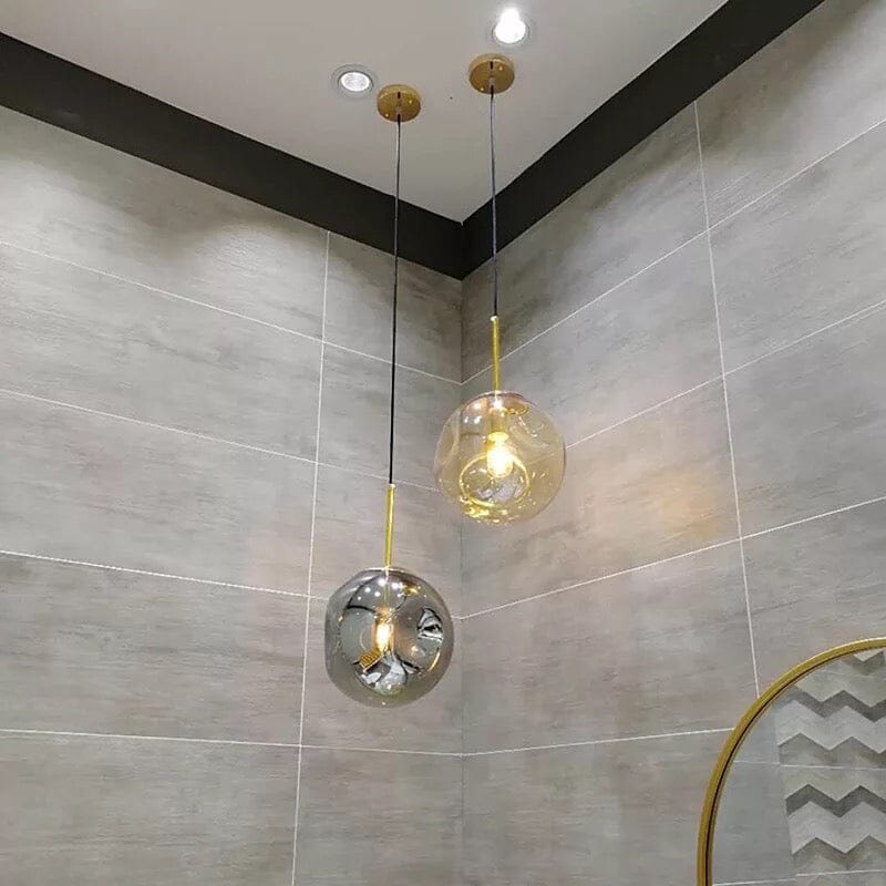 Lámpara colgante de vidrio Aurelle con silueta minimalista